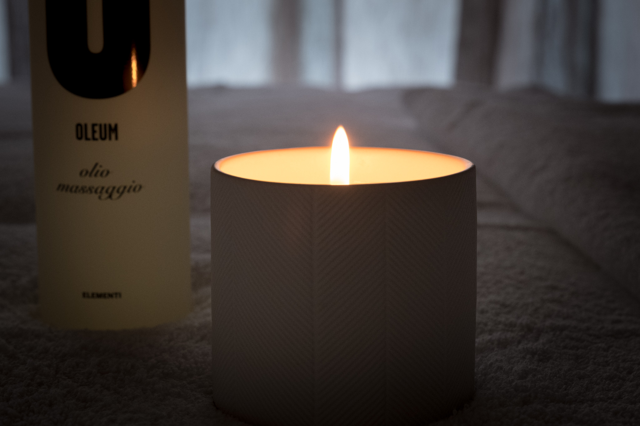 Atmosfera dello studio — candela e olio